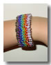 Bracciale arcobaleno di spille